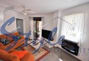 Ground Floor Apartment for Sale in Punta Prima, Costa Blanca - living room