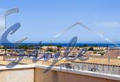 For sale a penthouse with the sea views and garden in La Cinuelica, Punta Prima, Costa Blanca. ID3336