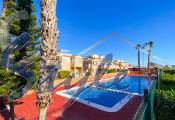 For sale a penthouse with the sea views and garden in La Cinuelica, Punta Prima, Costa Blanca. ID3336