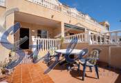 Se vende espaciosa casa adosada, sur, con vistas al mar en Punta Prima, Costa Blanca, España. ID1780