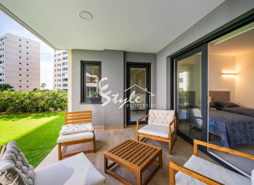 For Sale Frontline Apartment With Private Garden in Posidonia, Punta Prima, Costa Blanca. ID2354