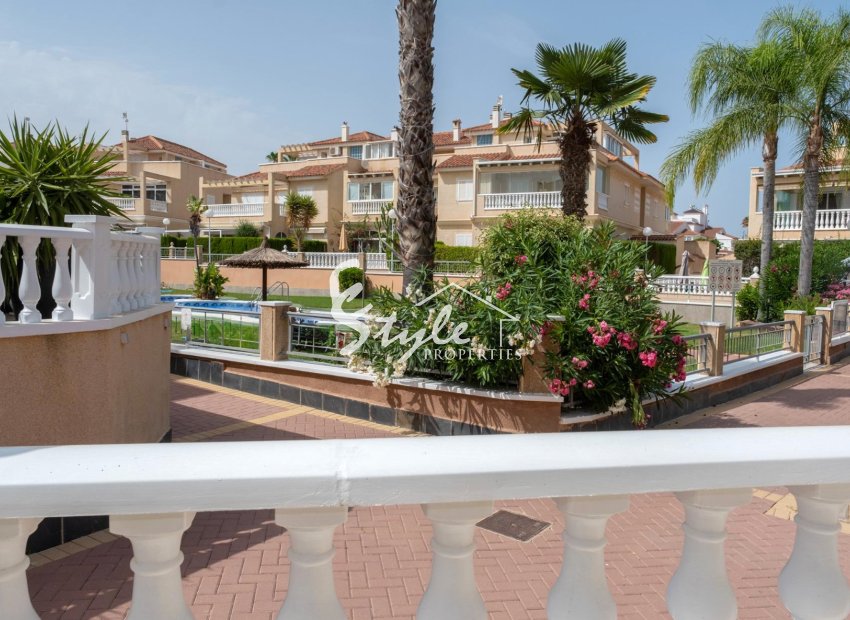 For sale Semi-Detached House in Zeniamar, Orihuela Costa with Private Garden, Solarium and Communal Pool. ID1467