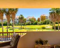 For sale south-facing apartment close to the beach in La Entrada, Punta Prima, Costa Blanca, Spain. ID3326