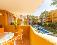 For sale south facing apartment with the views to community area in La Recoleta, Punta Prima. ID3044