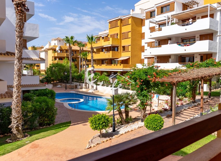 For Sale Sunny Apartment with Pool Views in La Entrada, Punta Prima, Costa Blanca. ID2434