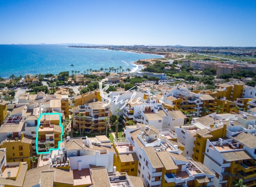 For sale top floor beach side apartment in La Recoleta, Punta Prima, Costa Blanca. ID3713