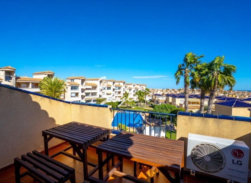 For sale townhouse of 3 bedrooms with sea views in Punta Prima, Los Altos, Costa Blanca, Spain. ID2338