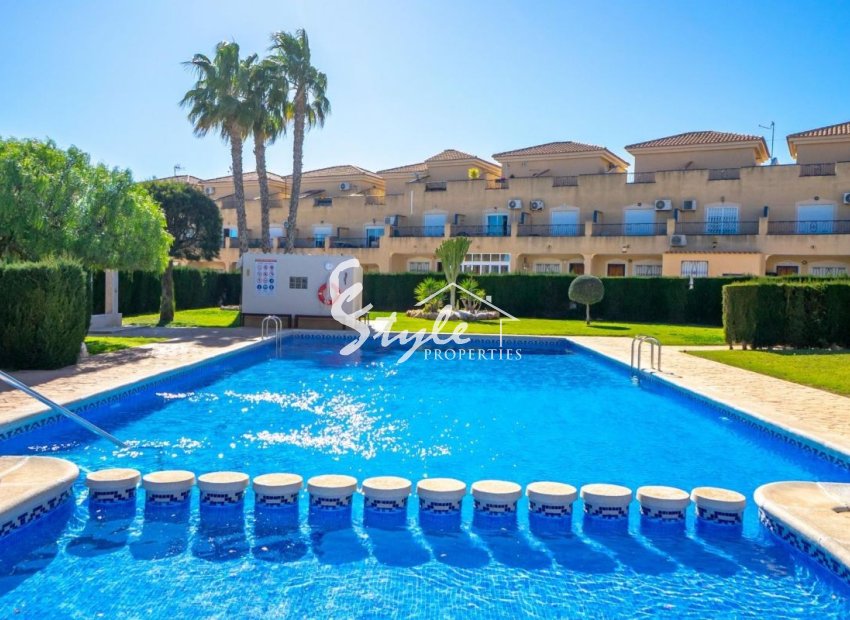 For sale townhouse of 3 bedrooms with sea views in Punta Prima, Los Altos, Costa Blanca, Spain. ID2338