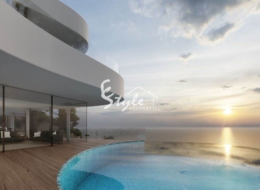 Купить новую роскошную виллу с бассейном, недалеко от моря в Бенидорме, рядом с пляжем на Коста Бланке. ID ON1144_45