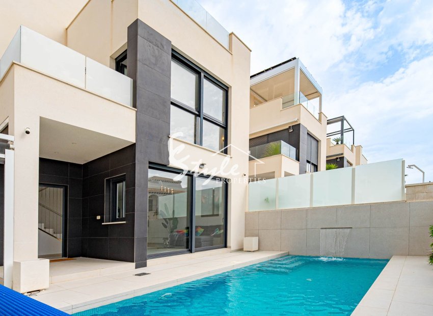 Modern detached villa with sea views, 4 bedrooms, for sale in Punta Prima, Costa Blanca, Spain. ID2930