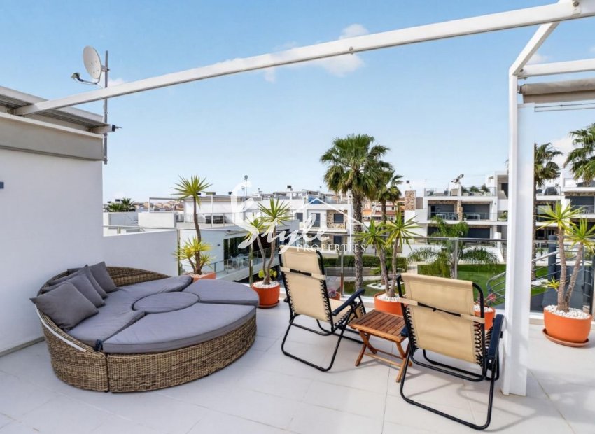 Modern South-Facing Top Floor apartment with Private Solarium, Pool Views and Garage in Punta Prima,  Orihuela Costa. Costa Blanca. Id 2291