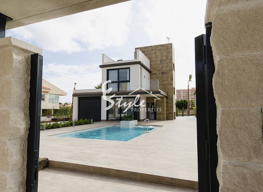 Новое строительство в Деэса де Кампоамор. Комплекс независимых вилл с частным бассейном недалеко от моря в Ориуэла Коста.