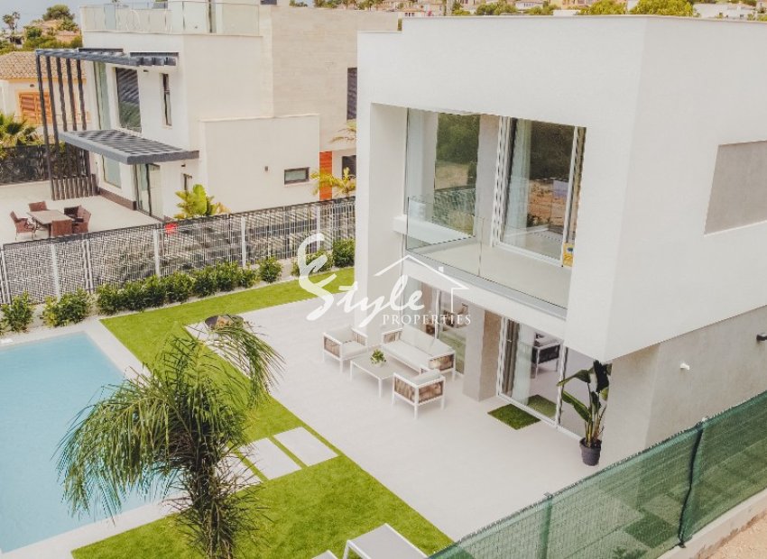 Новые эксклюзивные таунхаусы в в Финестрате, Бенидорм. ON1310