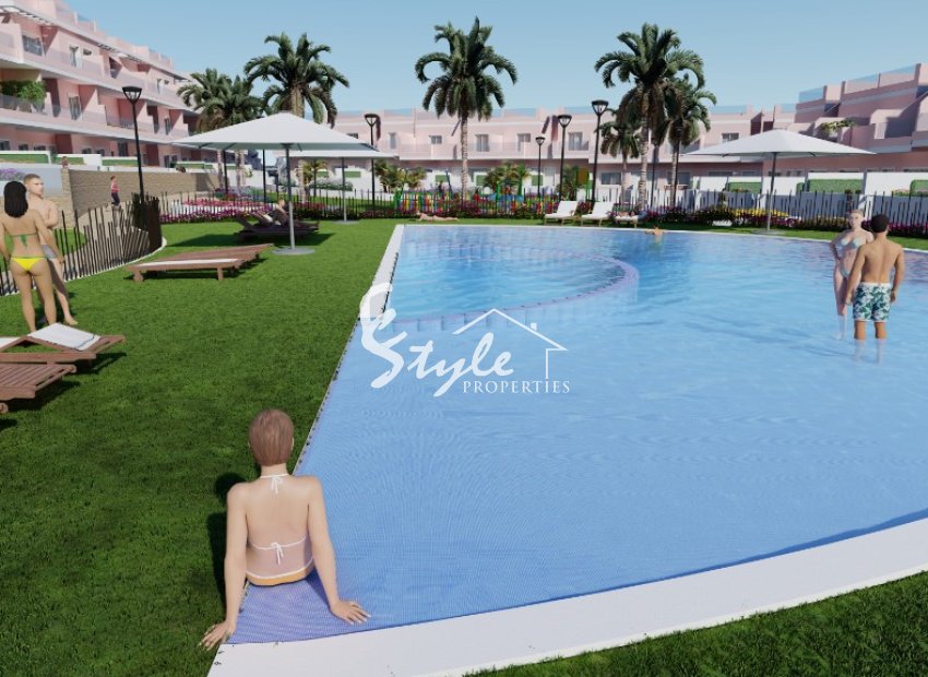 Продается новый таунхаус на берегу моря в Торре де ла Орадада, Коста Бланка, Испания. ON1233_A