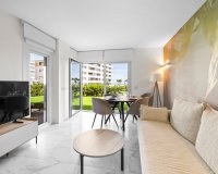 Se vende apartamento en primera línea con jardín privado en Posidonia, Punta Prima, Costa Blanca. ID2354