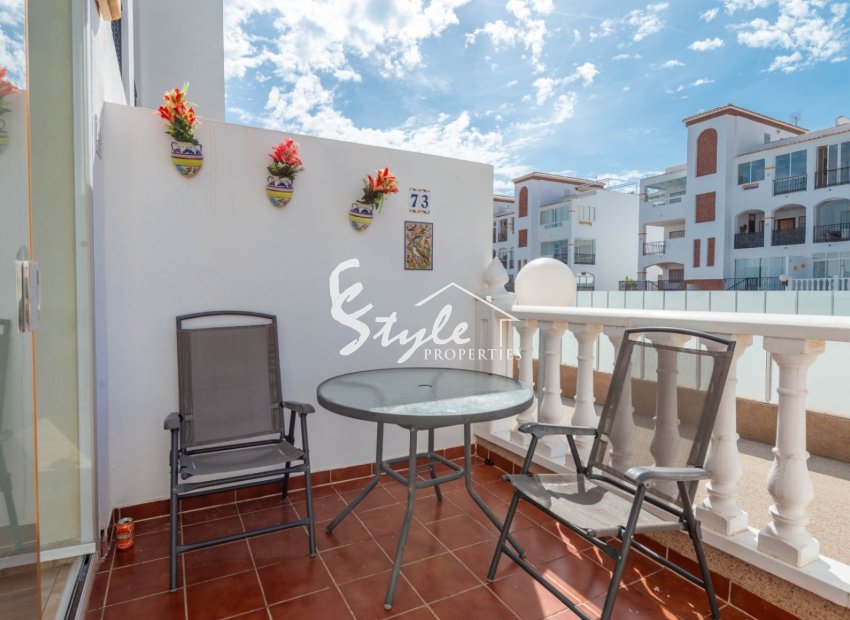 Se vende bonita planta baja en La Ciñuelica R-9, Punta Prima, Costa Blanca. ID1301
