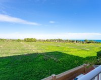 Se vende precioso apartamento de 3 dormitorios con vistas al mar en Punta Prima, Costa Blanca, España. ID2545