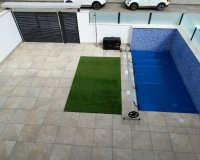 Таунхаусы новой постройки недалеко от пляжа в Торре-де-Орадада, Коста-Бланка, Испания. НА 1514