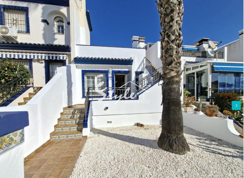 Townhouse in Los Doses, Villamartín with Private Gardens, Solarium and Communal Pool. ID 1471