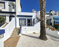 Townhouse in Los Doses, Villamartín with Private Gardens, Solarium and Communal Pool. ID 1471