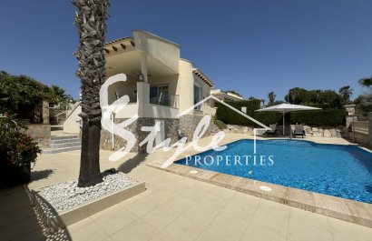 For sale villa in front of golf courses in Las Ramblas, Orihuela Costa, Spain. ID1440