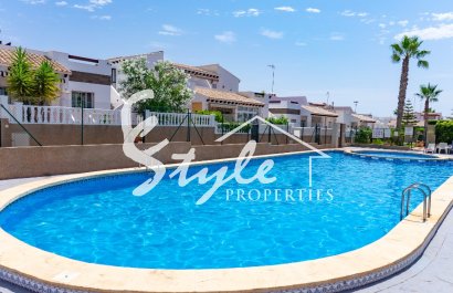 For sale top floor apartment with private garden in La Cinuelica, Punta Prima, Orihuela Costa. ID1940