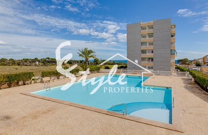 Se vende precioso apartamento de 3 dormitorios con vistas al mar en Punta Prima, Costa Blanca, España. ID2545