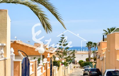Charming 2 Bedroom house for Sale in Punta Prima – Large Solarium & Excellent Location, Costa Blanca, Spain. ID 2361