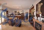 Villa with large plot for sale in La Marina, Costa Blanca - living room