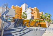 Apartamento a pie de la playa en lujosa urbanización La Entrada en Punta Prima, Costa Blanca, España