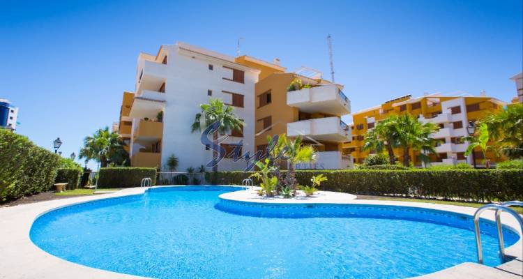 Apartments close to the sea with pool and garage in a gated urbanization Park Recoleta, Punta Prima, Orihuela Costa, Costa Blanca, Spain