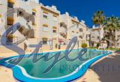 Apartment with large private garden and parking space just 200m from the beach of Punta Prima, Orihuela Costa, Costa Blanca, Spain