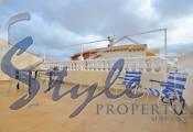 Bonito quad-bungalow en urbanización junto al mar La Ciñuelica en Punta Prima, Costa Blanca, España