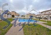 Bonito quad-bungalow en urbanización junto al mar La Ciñuelica en Punta Prima, Costa Blanca, España