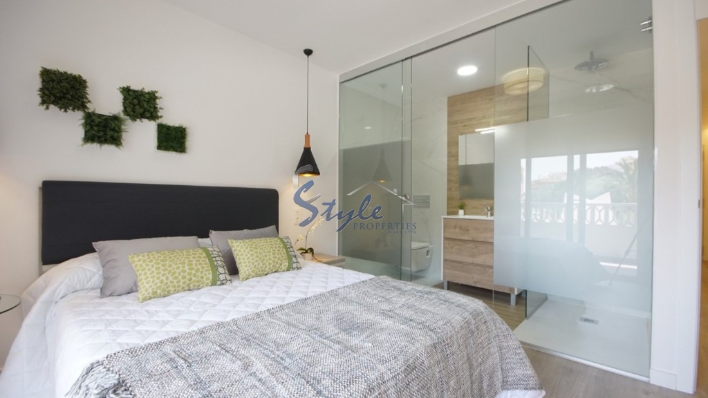 apartment completely renovated a step away from the sea for sale in Punta Prima, Orihuela Costa.