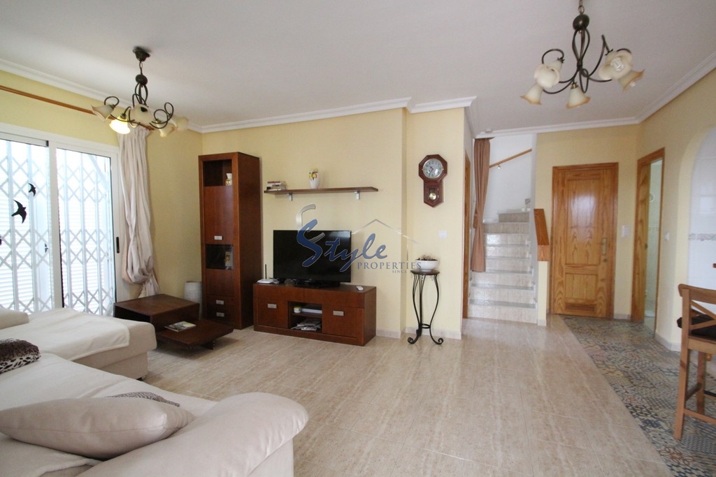 sell a townhouse in residential “Zenia Mar III” in front of the pool in Playa Flamenca, Orihuela Costa