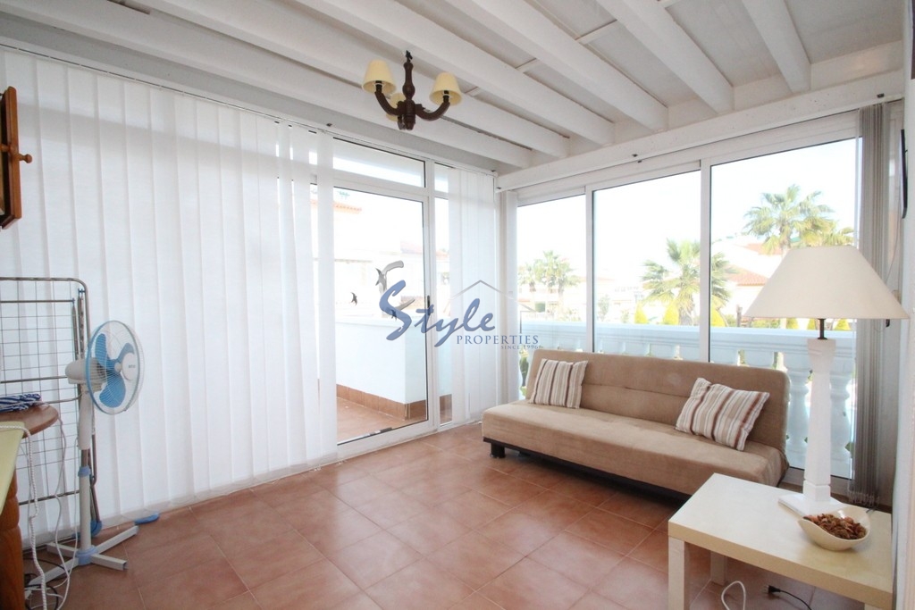 sell a townhouse in residential “Zenia Mar III” in front of the pool in Playa Flamenca, Orihuela Costa