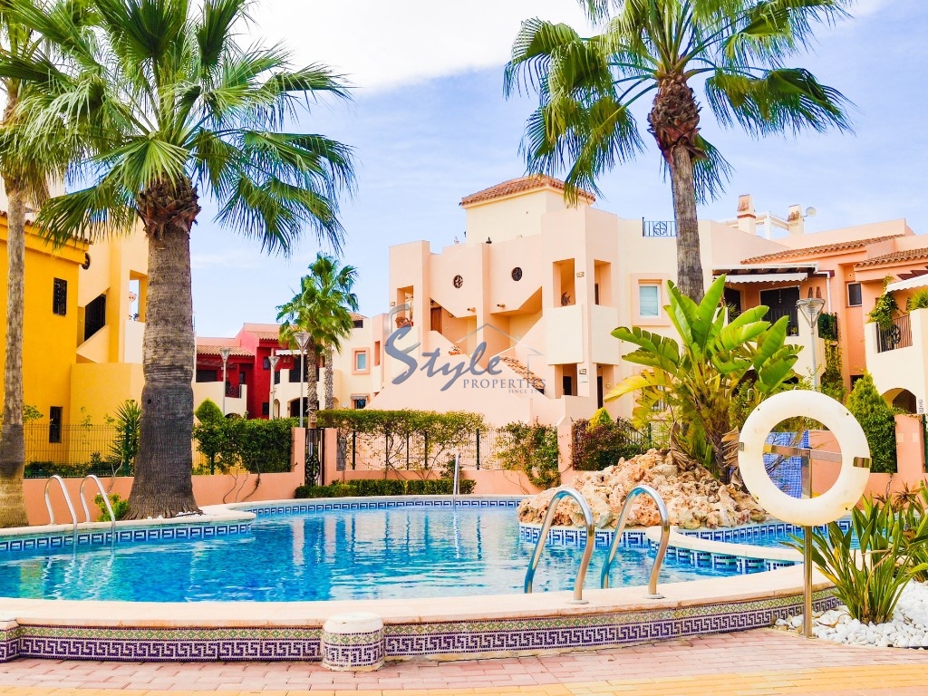 For sale top floor apartment in Punta Marina, Punta Prima, Costa Blanca. ID 4459