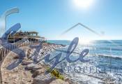 Buy beachside apartment in Costa Blanca close to sea in Punta Prima. ID: 4502