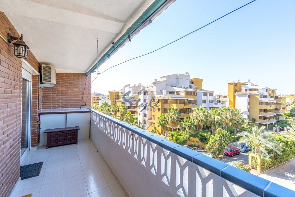 Buy beachside apartment in Costa Blanca close to sea in Punta Prima. ID: 4502