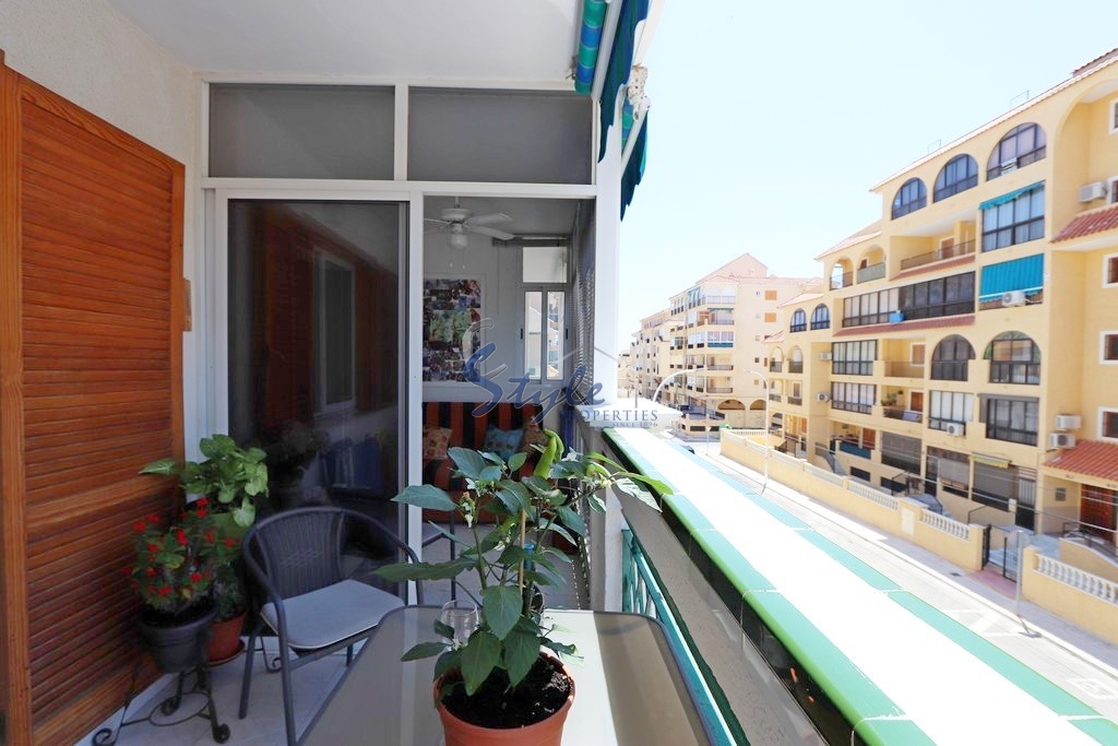Buy beachside apartment in Costa Blanca close to sea in Punta Prima. ID: 4503