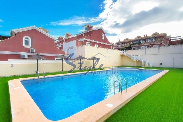 Buy semidetached chalet with private pool and garden in Costa Blanca close to golf in Villamartin. ID: 4544