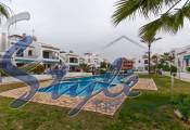 Buy ground floor bungalow with private pool and garden in Costa Blanca close to golf in Villamartin. ID: 4557