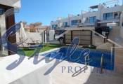 Buy semidetached chalet with private pool and garden in Costa Blanca close to golf in Villamartin. ID: 4571