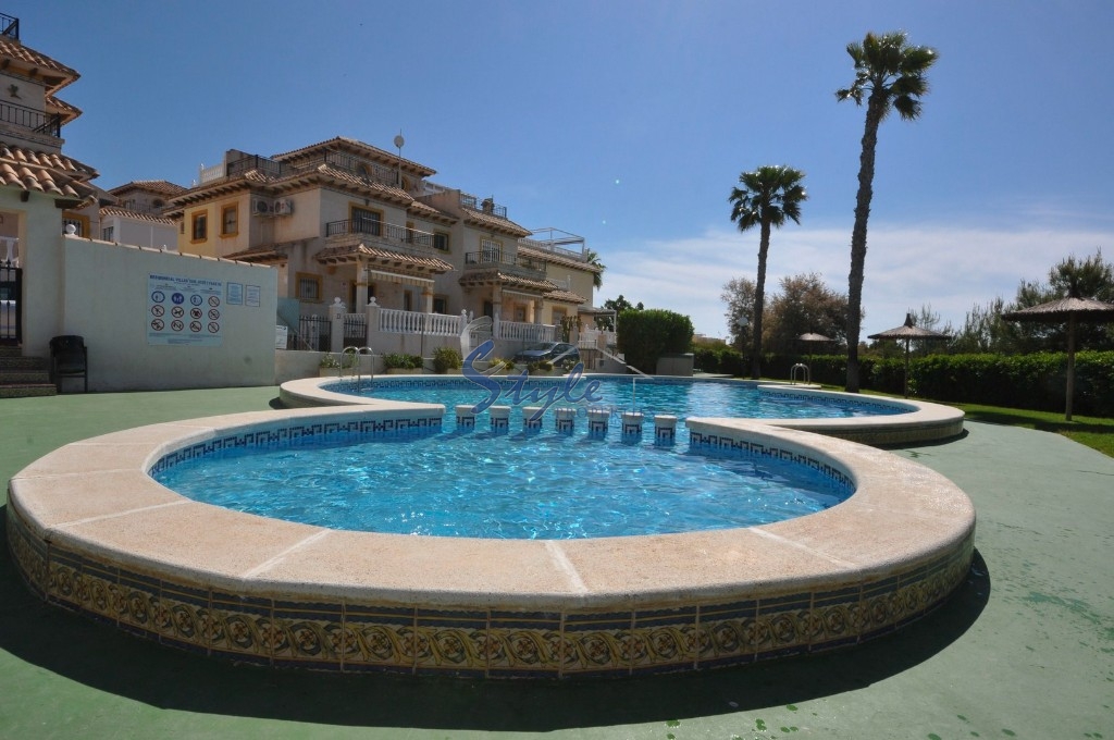 Buy terraced house with pool in Playa Flamenca, Orihuela Costa. ID: 4504