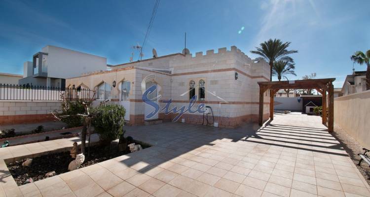 Buy semidetached villa with lovely garden areas and pool El Chaparral, Torrevieja, Costa Blanca. ID: 4748