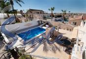 Buy semidetached villa with lovely garden areas and pool El Chaparral, Torrevieja, Costa Blanca. ID: 4748