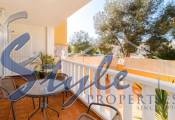 Buy ground floor apartment with garden in Costa Blanca close to golf in Playa Golf II, Villamartin. ID: 4075