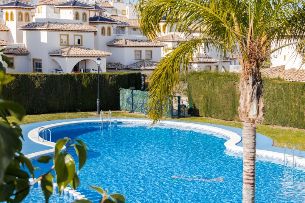 Buy ground floor apartment with garden in Costa Blanca close to golf in Playa Golf II, Villamartin. ID: 4075