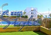 Comprar dúplex adosado con garaje y piscina muy cerca del mar y ambas playas en Playa Flamenca, Orihuela Costa. ID: 4272